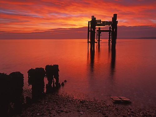 Coast : "The Dolphins" and Groyne at Sunrise